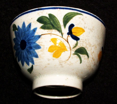 Hand painted pearlware demitasse excavated from the Brant property.